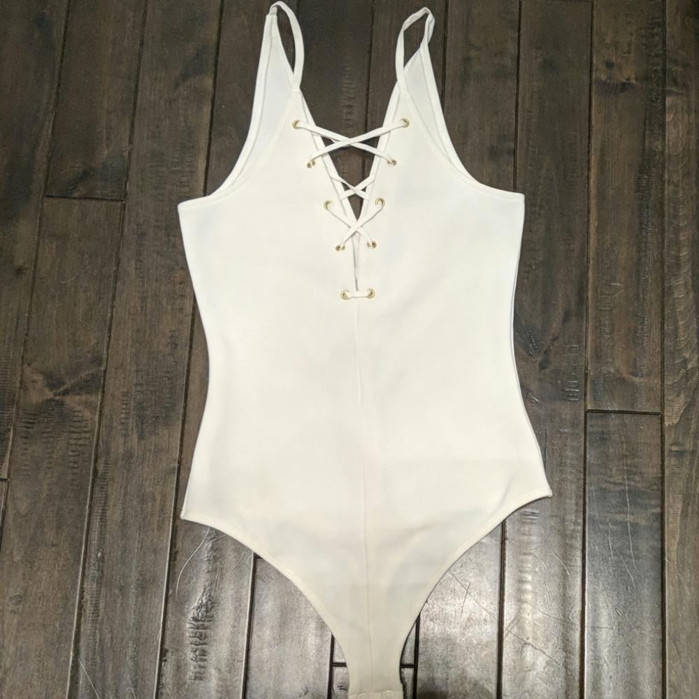 Cream colored Express bodysuit